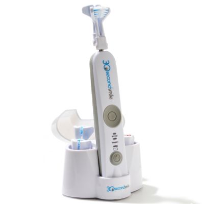 30 Second Smile Electric Toothbrush and Four Sets of Replacement Brush Heads