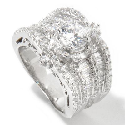 BLTA SS/PLAT BAGUETTE AND ROUND THREE ROW RING W/ ROUND CUT CENTER