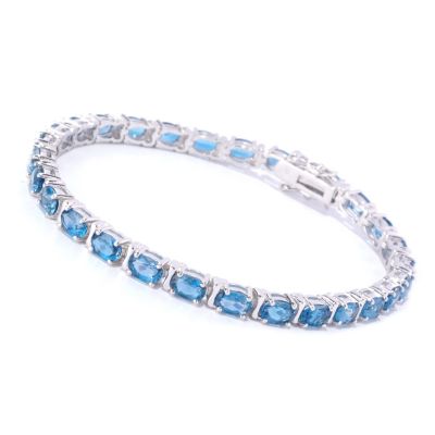 127-628 - Gem Insider Sterling Silver Oval Cut London Blue Topaz Tennis Bracelet 