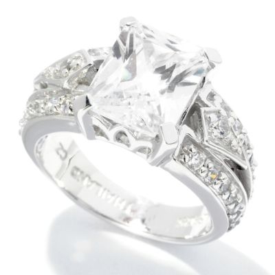 BRIL SS/PLAT EMERALD AND ROUND CUT BOLD RING RING