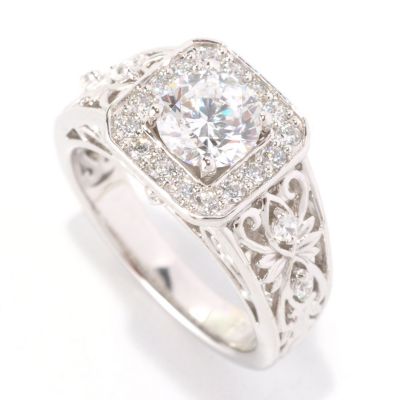 SS/PLAT ROUND CUT SOLITAIRE W/CUT CORNER HALO AND HEART FILIGREE SHANK