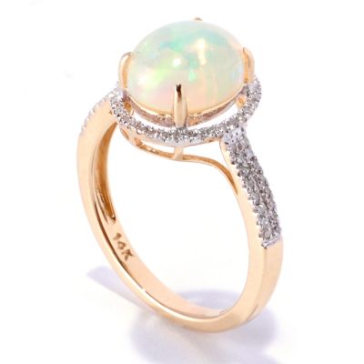 129-586 - Gem Treasures 14K Gold Oval Ethiopian Opal & Diamond Halo Ring