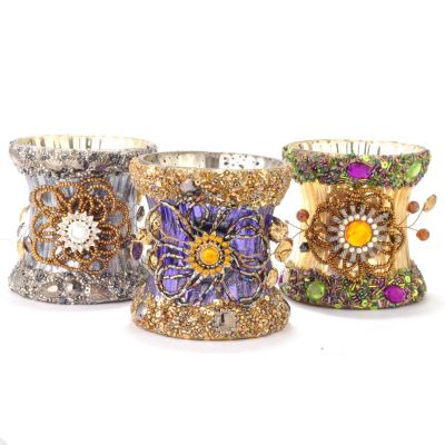 SET OF THREE GLASS VOTIVES