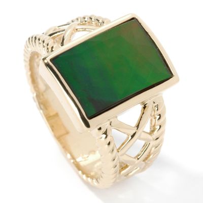 Enchant your audience with the decadent glow of this ring! A mixture of colors, this sleek design presents one rectangle shaped 12 x 8mm multi-colored ammolite in a bezel setting.