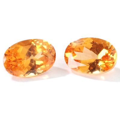 V75024 -  Set of Two Oval Cut 7 x 5mm Mandarin Spessartite Garnets